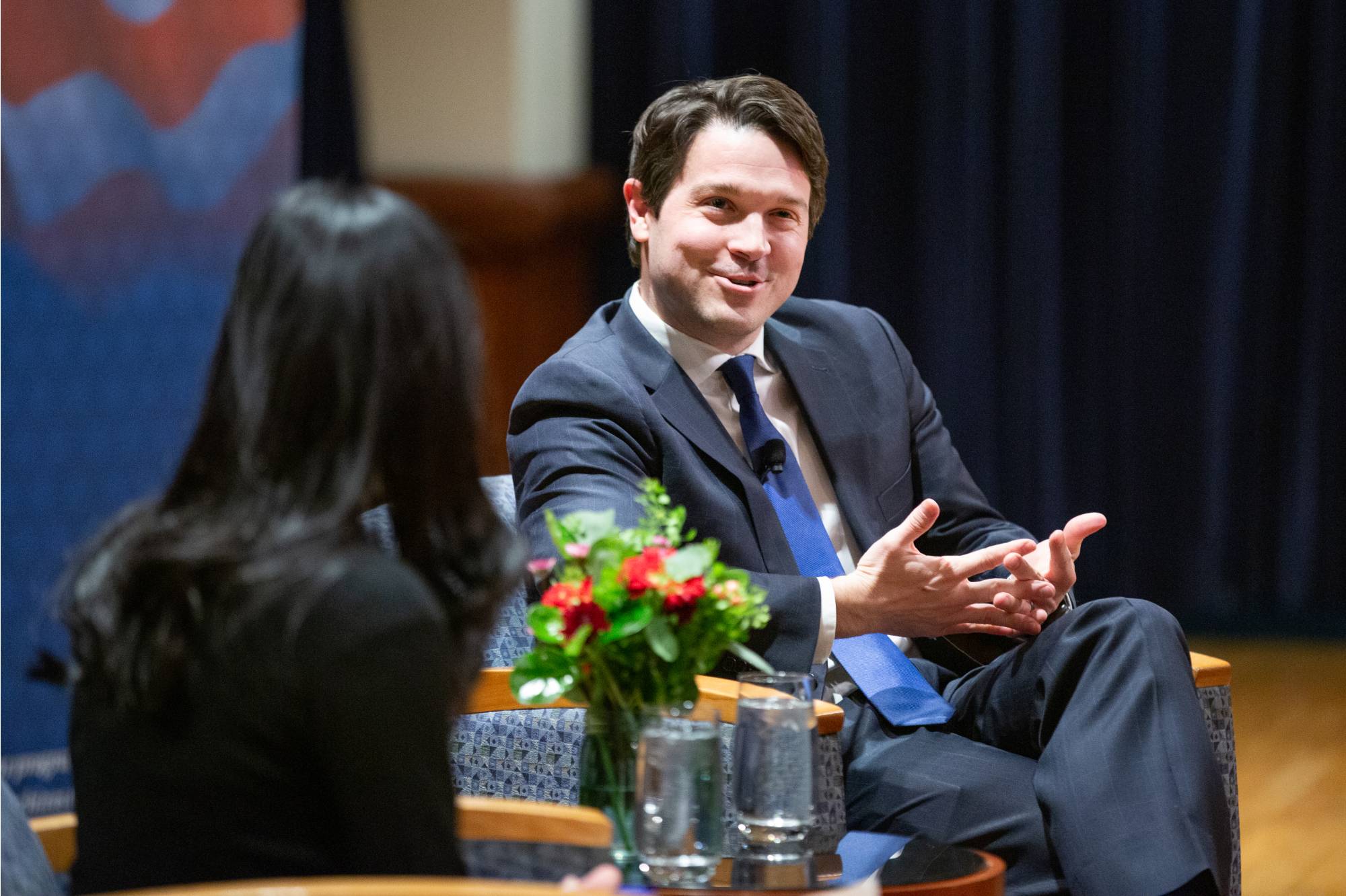 person speaking at a podium